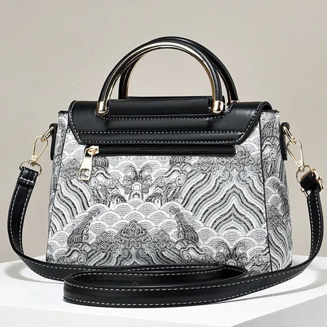 Elegante Handtasche für Damen ⎜ Modische Umhängetasche mit hochwertiger Stickerei und Herzanhänger