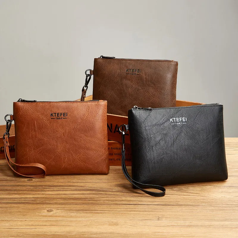 Leder Clutch für Herren ⎜ Modische Handtasche für Business und Freizeit im schlanken Design