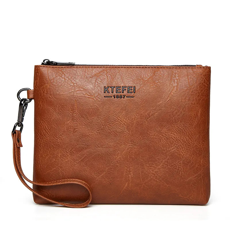 Leder Clutch für Herren ⎜ Modische Handtasche für Business und Freizeit im schlanken Design