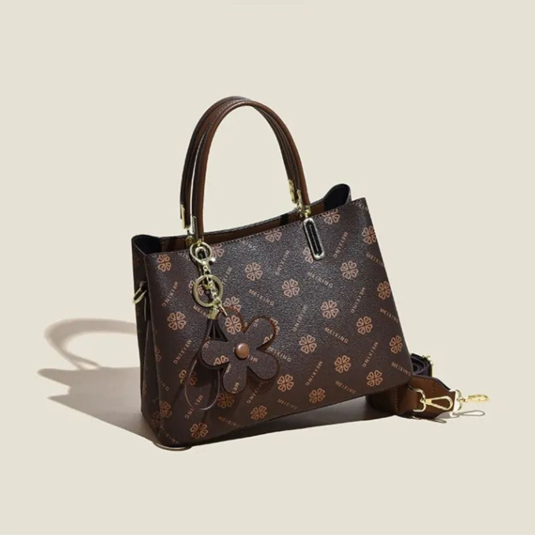 Geräumige Crossbody Tasche für Damen ⎜ Stilvolle Handtasche mit Blumenanhänger und verstellbarem Schultergurt