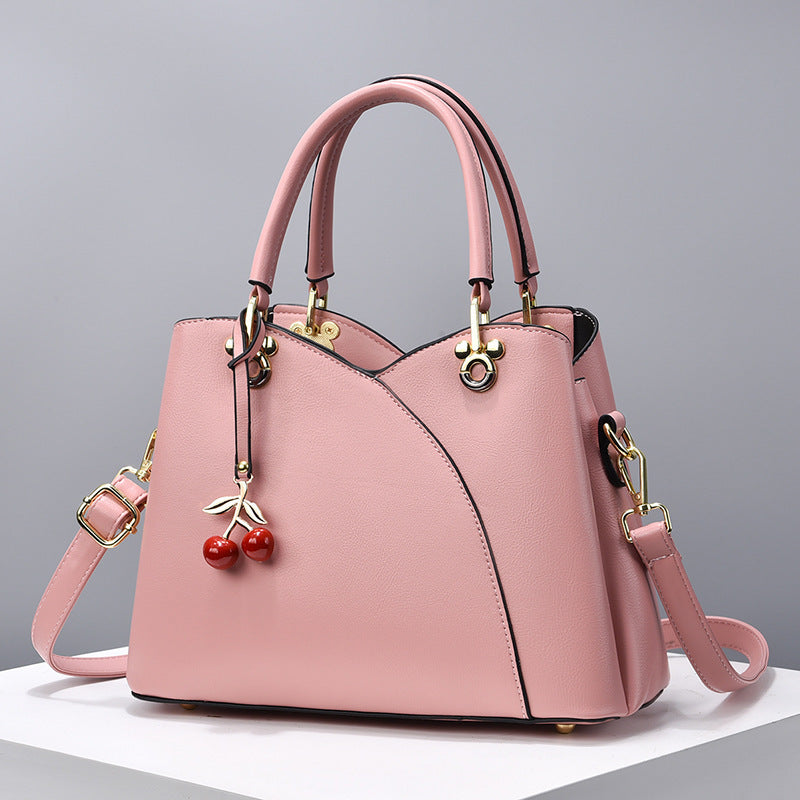 Elegante Handtasche für Damen ⎜ Modische Umhängetasche mit Kirschenanhänger