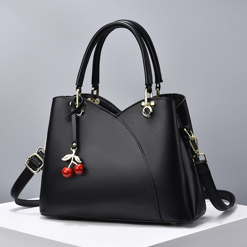 Elegante Handtasche für Damen ⎜ Modische Umhängetasche mit Kirschenanhänger