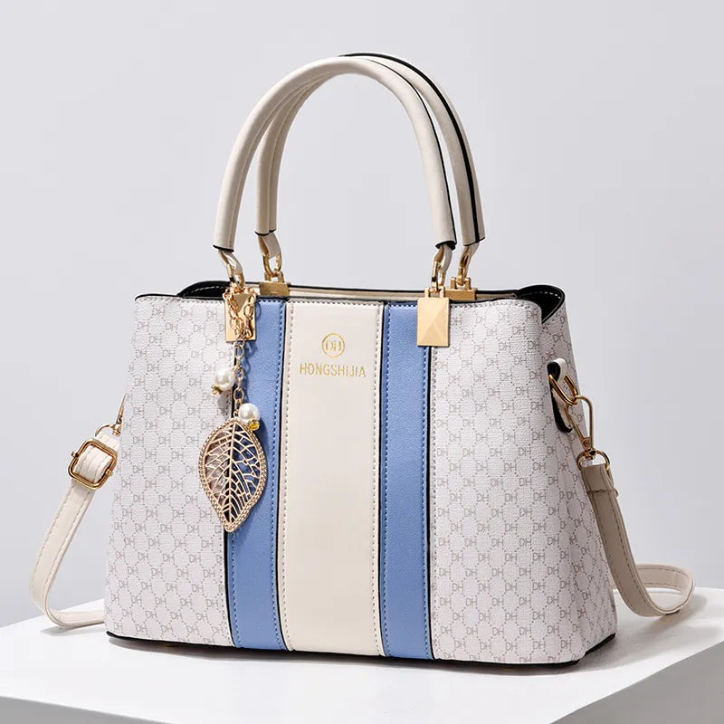 Elegante Schultertasche für Damen ⎜ Vielseitige Handtasche mit Kontrastfarben und großzügigem Stauraum