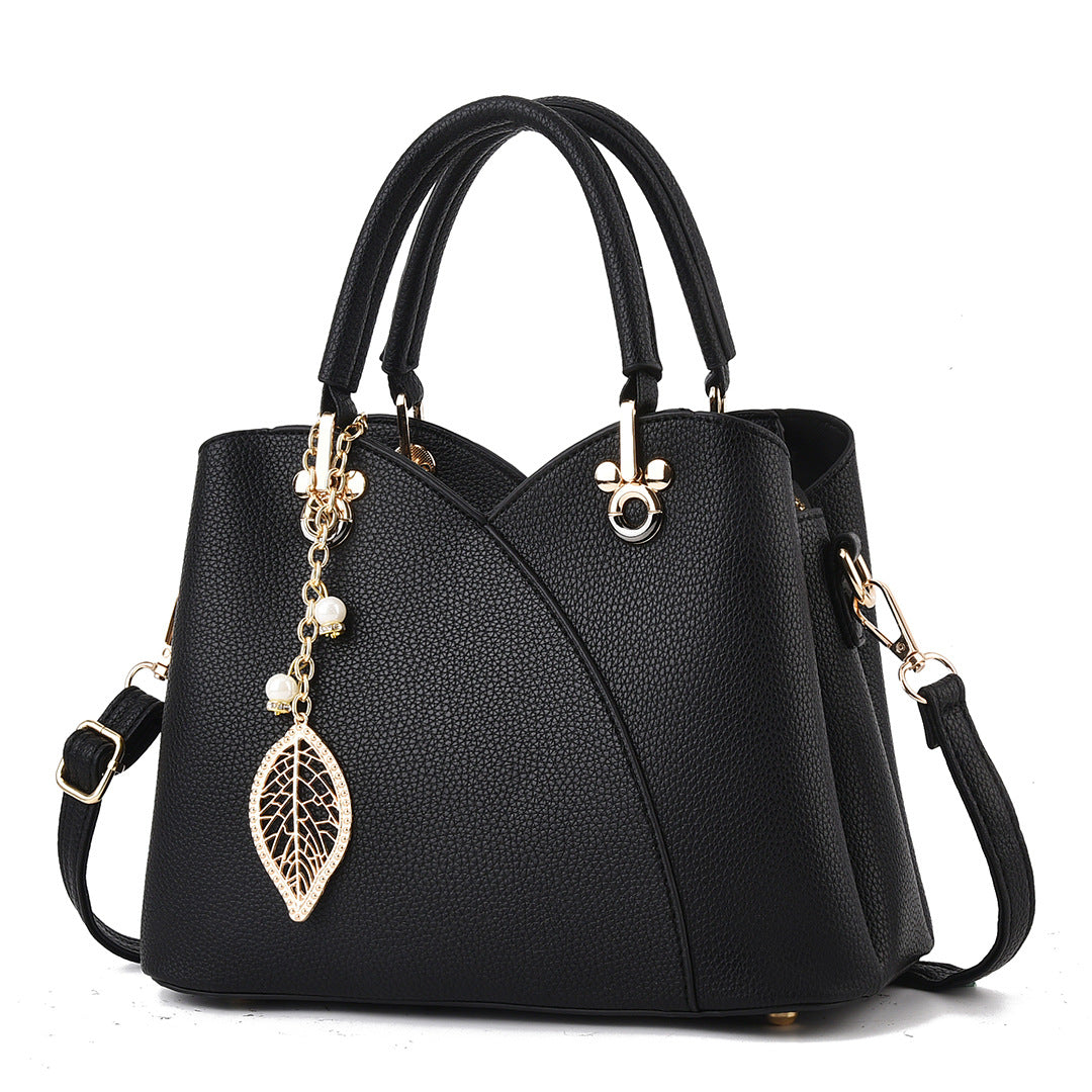 Elegante Handtasche für Damen ⎜ Stilvolle Umhängetasche mit Blattanhänger und praktischem Design