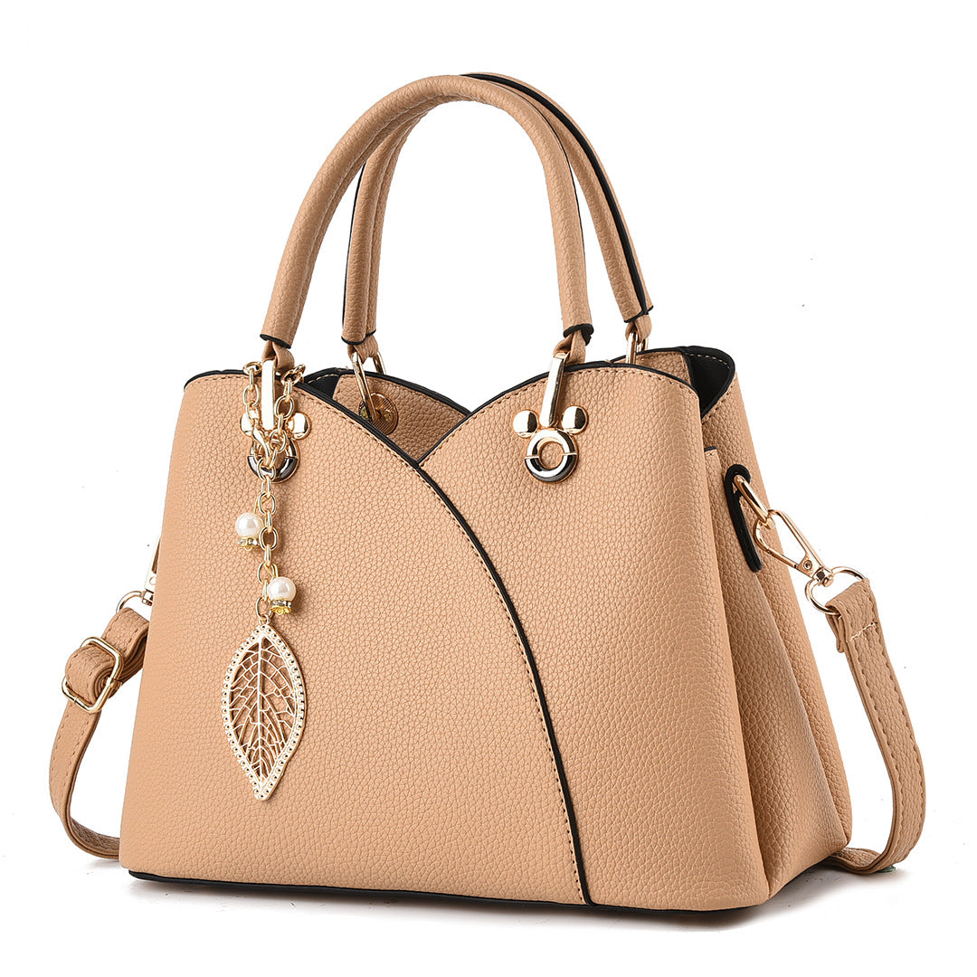 Elegante Handtasche für Damen ⎜ Stilvolle Umhängetasche mit Blattanhänger und praktischem Design