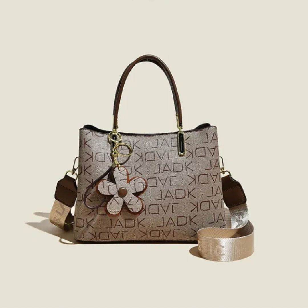 Geräumige Crossbody Tasche für Damen ⎜ Stilvolle Handtasche mit Blumenanhänger und verstellbarem Schultergurt