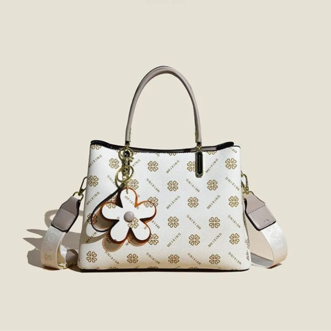 Geräumige Crossbody Tasche für Damen ⎜ Stilvolle Handtasche mit Blumenanhänger und verstellbarem Schultergurt