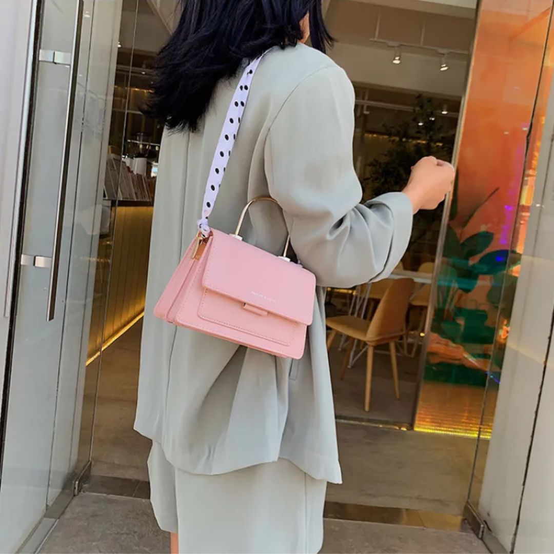 Umhängetasche für Damen ⎜ Modische Tasche mit Polka-Dots Schleife und Kettenriemen