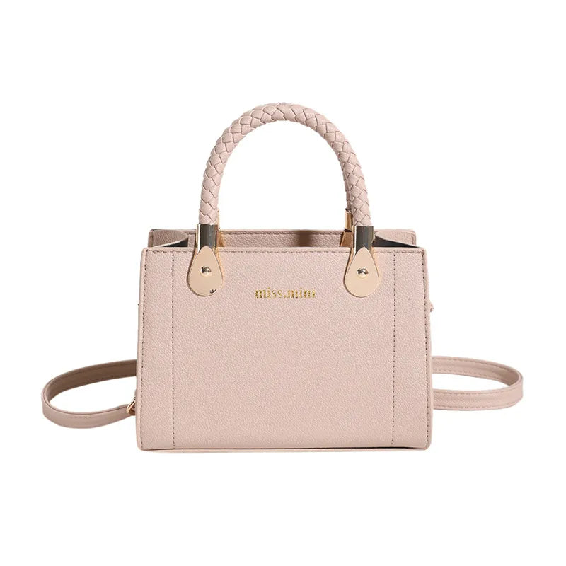 Trendy Handtasche für Damen ⎜ Kompakte Umhängetasche mit geflochtenem Griff und modernem Design
